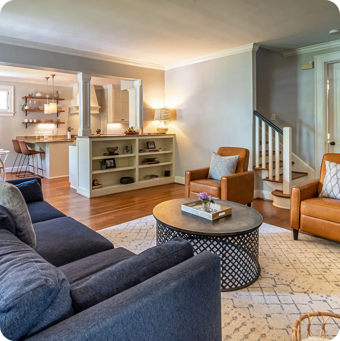 Finished basement living room with modern furniture and warm colors in Mason, Ohio